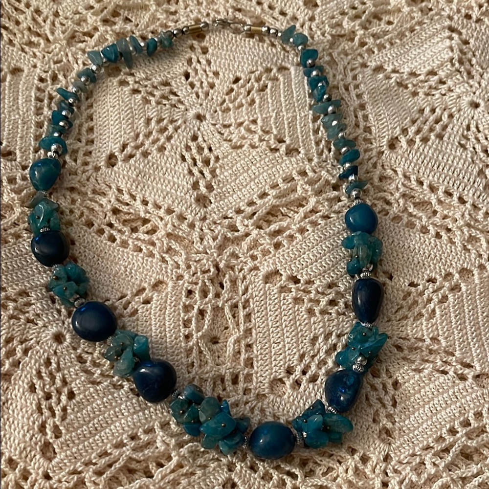 Elegant Blue Necklace with Unique Bead Textures
